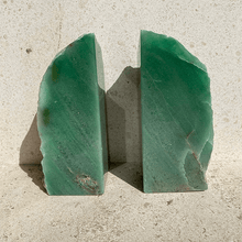 Load image into Gallery viewer, Aventurine green bookends, styled on natural stone
